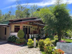 Κήπος έξω από το Leuser Inn & Jungle Trekking +22 φωτογραφίες