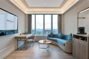 TV a/nebo společenská místnost v ubytování Mercure Guangzhou Nansha