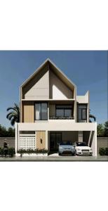 uma representação de uma casa com dois carros em Sierra Villa Malang - Private Swimming Pool - 4 BR em Ngadipuro