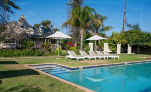 Bazén v ubytování Bakenskraal Ostrich Palace nebo v jeho okolí