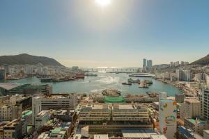 a view of a river in a city with buildings at New CZ Nampo Hotel in Busan