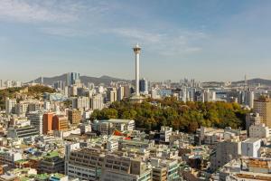 a view of a city with a tall tower at New CZ Nampo Hotel in Busan