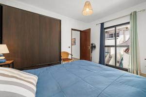 Postel nebo postele na pokoji v ubytování Casa Tété