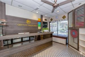 Πιστοποιητικό, βραβείο, πινακίδα ή έγγραφο που προβάλλεται στο OYO 91258 Qish Hotel Banda Kaba