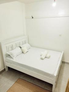 Postel nebo postele na pokoji v ubytování Kehlani Homes Kakamega