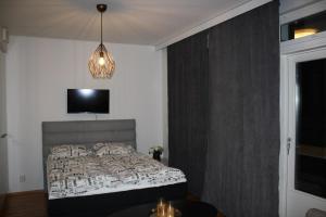 Postel nebo postele na pokoji v ubytování Cozy and modern studio in a top location