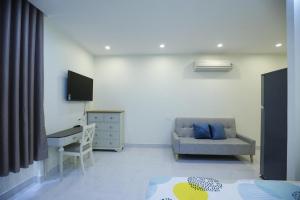 Μια τηλεόραση ή/και κέντρο ψυχαγωγίας στο Victoria Hotel And Apartment +9 φωτογραφίες