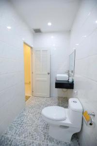 Ένα μπάνιο στο Victoria Hotel And Apartment