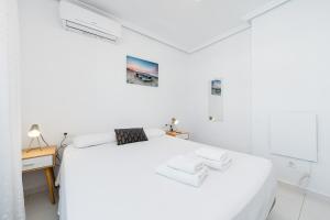 Postel nebo postele na pokoji v ubytování Bungalow Sunrise Europa