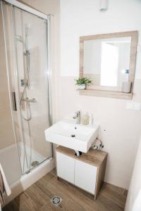 Koupelna v ubytování Das blaue Haus + 22 fotografií