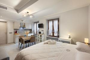 Postel nebo postele na pokoji v ubytování Residence Brugnano