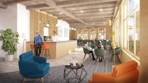 eine Lobby mit Leuten, die an Tischen sitzen in der Unterkunft SOWELL FAMILY Vars in Vars + 29 Fotos