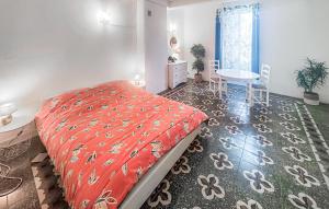 Ένα ή περισσότερα κρεβάτια σε δωμάτιο στο Grande Maison De Village