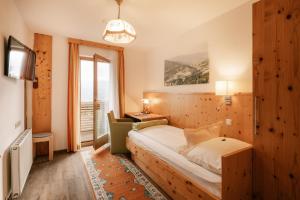 Ένα ή περισσότερα κρεβάτια σε δωμάτιο στο Hotel Käferhube