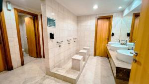 Ένα μπάνιο στο فندق ميزاب أوركيد جرول