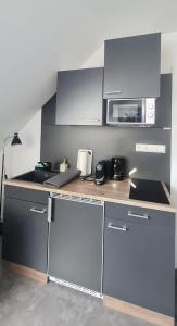 Η κουζίνα ή μικρή κουζίνα στο Delikanto Apartments