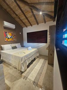 Giường trong phòng chung tại Elohim Beach Flats - Fortim - Praia Pontal de Maceió +19 ảnh