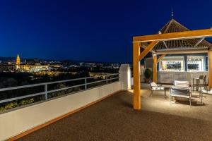 Un balcón o terraza en Hesperia Córdoba 42 fotos más