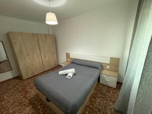 Ένα ή περισσότερα κρεβάτια σε δωμάτιο στο AVENIDA CENTRO 2 Dormitorios PONDOS