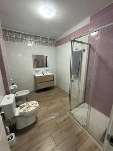 Ένα μπάνιο στο AVENIDA CENTRO 2 Dormitorios PONDOS +8 φωτογραφίες