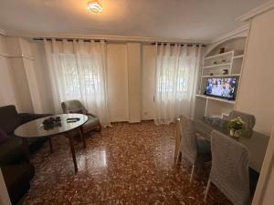 Μια τηλεόραση ή/και κέντρο ψυχαγωγίας στο AVENIDA CENTRO 2 Dormitorios PONDOS