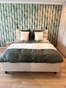 Foto sihtkohas Tournai asuva majutusasutuse Chambre d'hôtes Lucia avec vue sur jardin arboré galeriist