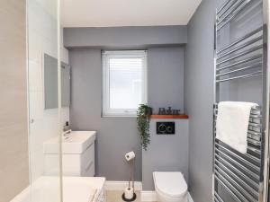 Koupelna v ubytování Postmans Lodge + 36 fotografií