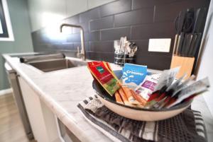 a bowl of food on a counter in a kitchen at Lagoon Apartments in Nuku‘alofa +7 photos