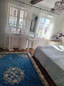 Postel nebo postele na pokoji v ubytování Klockargården Örja byväg 17