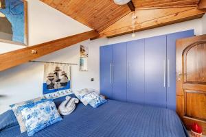 Ένα ή περισσότερα κρεβάτια σε δωμάτιο στο Ca' Berio 67