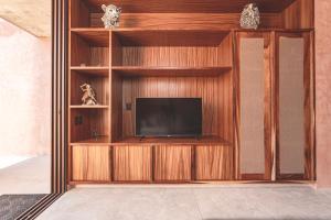 Et tv og/eller underholdning på Entorno Tulum - Luxury Villas