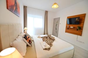 TV a/nebo společenská místnost v ubytování FLH - Yellowstone