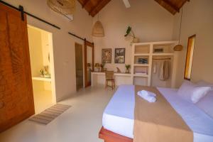 Ένα ή περισσότερα κρεβάτια σε δωμάτιο στο De Duck