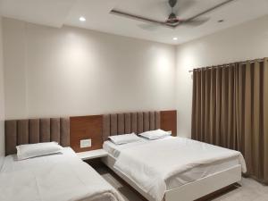 Fotografie z fotogalerie ubytování Abhishek Pride v destinaci Godhegaon