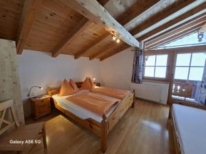 Postel nebo postele na pokoji v ubytování BIO- Bauernhof Obermaurach + 54 fotografií