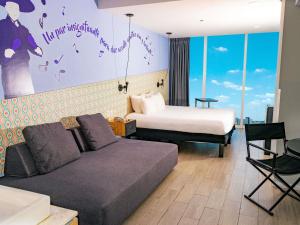 Χώρος καθιστικού στο Ibis Styles Merida Galerias +103 φωτογραφίες