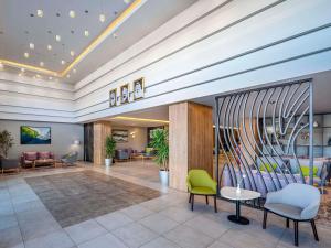 Khu vực ghế ngồi tại Adagio Aparthotel Jeddah Malik Road