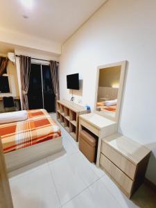 Billede fra billedgalleriet på Apartemen springwood i Kebonnanas