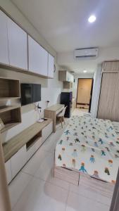 Kuchyň nebo kuchyňský kout v ubytování Apartemen springwood