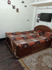 Ένα ή περισσότερα κρεβάτια σε δωμάτιο στο ground floor room