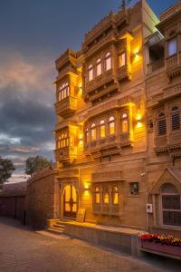 a large wooden building with lights on it at The second home jaisalmer in Jaisalmer