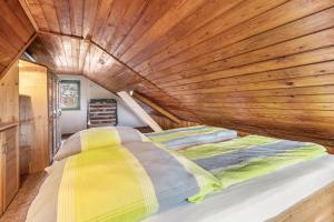 Ένα ή περισσότερα κρεβάτια σε δωμάτιο στο Kleines Ferienhaus Kirschallee