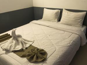 Ένα ή περισσότερα κρεβάτια σε δωμάτιο στο Grand Aulia Hotel