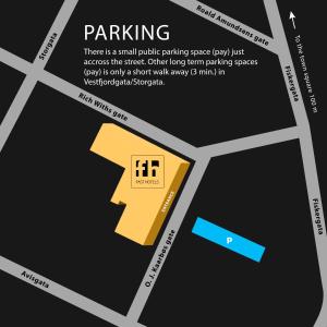 a map of a parking lot with a yellow parking sign at Fast Hotel Svolvær in Svolvær