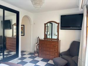 Et tv og/eller underholdning på Casa Limonar By Solymar Holiday