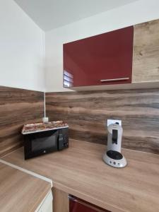 Η κουζίνα ή μικρή κουζίνα στο Villa Raie qui bulle 3 chambres climatisées