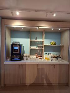 Kuchyň nebo kuchyňský kout v ubytování Unisotel + 34 fotografií