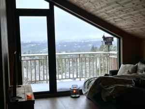 Nespecifikovaný výhled na hory nebo výhled na hory při pohledu z apartmánu