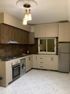 Kuchyň nebo kuchyňský kout v ubytování Résidence Atlantic