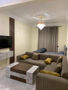 TV a/nebo společenská místnost v ubytování Résidence Atlantic + 33 fotografií